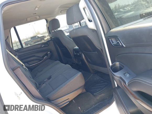 2015 Chevrolet Tahoe LS with VIN 1GNSCAKCXFR748554, listed as a IAAI auction lot 41765865 with 160,282 mi miles and . Bid and sale history available at DreamBid. Image 8.