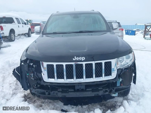 2011 Jeep Grand Cherokee Overland with VIN 1J4RR6GT5BC604784, listed as a IAAI auction lot 41515626 with 66,654 mi miles. Bid and sale history available at carsss.com. Image 13.