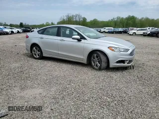 2018 Ford Fusion SE z VIN 3FA6P0H74JR112086, wystawiony jako Copart lot #56630275 z przebiegiem 123 300 mil mil oraz Szkoda całkowita • Salvage title. Historia ofert i sprzedaży dostępna na DreamBid. Obrazek 14.