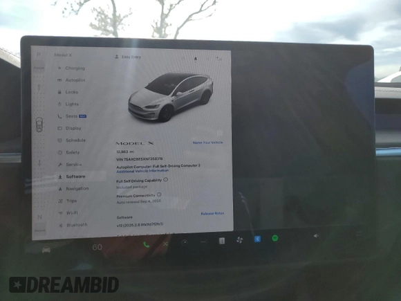 2022 Tesla Model X with VIN 7SAXCBE5XNF358319, listed as a Copart auction lot 50246555 with 12,863 mi miles and Salvage Title. Bid and sale history available at DreamBid. Image 9.