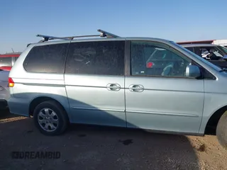2003 Honda Odyssey EX-L with VIN 5FNRL18983B071606, listed as a IAAI auction lot 41783246 with 271,028 mi miles and . Bid and sale history available at DreamBid. Image 13.