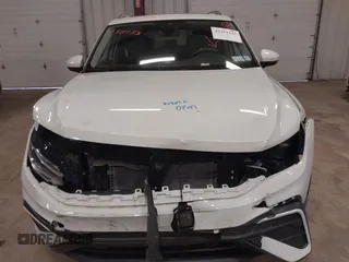 2024 Volkswagen Tiguan SE with VIN 3VVMB7AX6RM135219, listed as a IAAI auction lot 42311133 with 7,885 mi miles and . Bid and sale history available at DreamBid. Image 6.