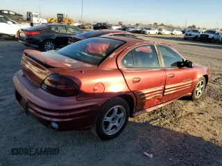2001 Pontiac Grand Am SE1 with VIN 1G2NF52T91M517918, listed as a Copart auction lot 88164755 with 135,944 mi miles and Salvage Title. Bid and sale history available at carsss.com. Image 3.