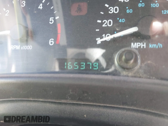 2000 Jeep Wrangler Sport with VIN 1J4FA49S0YP770943, listed as a IAAI auction lot 41817600 with 165,379 mi miles and . Bid and sale history available at DreamBid. Image 7.