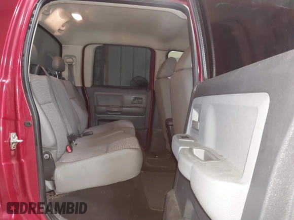 2008 Dodge Dakota SLT z VIN 1D7HW48N38S542692, wystawiony jako IAAI lot #41554521 z przebiegiem 166 482 mil mil oraz . Historia ofert i sprzedaży dostępna na DreamBid. Obrazek 8.