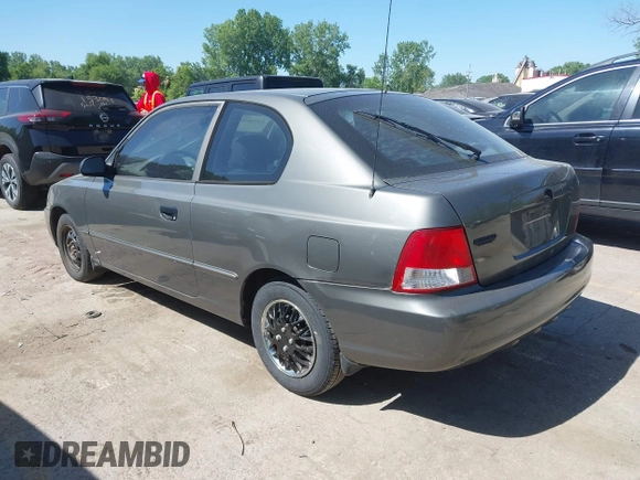 2001 Hyundai Accent GLS z VIN KMHCG35C01U136132, wystawiony jako IAAI lot #42293830 z przebiegiem 111 906 mil mil oraz . Historia ofert i sprzedaży dostępna na DreamBid. Obrazek 3.