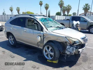 2006 Lexus RX 400h with VIN JTJHW31U860031359, listed as a IAAI auction lot 42648566 with 179,063 mi miles and . Bid and sale history available at DreamBid. Image 1.