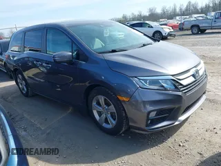 2018 Honda Odyssey EX-L with VIN 5FNRL6H77JB101803, listed as a IAAI auction lot 41927622 with 147,587 mi miles. Bid and sale history available at carsss.com. Image 1.