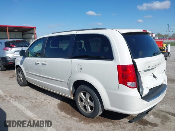 2013 Dodge Grand Caravan SXT with VIN 2C4RDGCG2DR522136, listed as a IAAI auction lot 42023561 with 176,635 mi miles and . Bid and sale history available at DreamBid. Image 14.