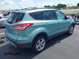 2013 Ford Escape SE with VIN 1FMCU9GX0DUC75662, listed as a IAAI auction lot 42549360 with 156,666 mi miles and . Bid and sale history available at DreamBid. Image 4.