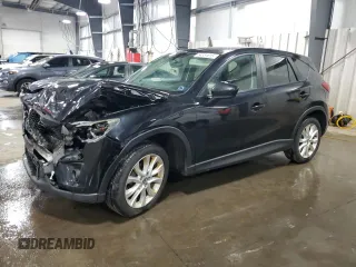 2014 Mazda CX-5 Grand Touring with VIN JM3KE4DY0E0322606, listed as a Copart auction lot 54381815 with 216,022 mi miles and Salvage Title. Bid and sale history available at DreamBid. Image 1.