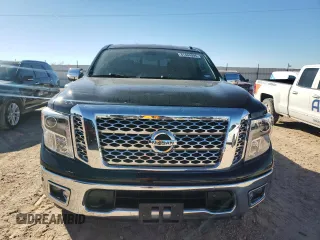 2017 Nissan Titan SL z VIN 1N6AA1E54HN554049, wystawiony jako Copart lot #81404094 z przebiegiem 97 811 mil mil oraz Czysty tytuł • Clean title. Historia ofert i sprzedaży dostępna na DreamBid. Obrazek 5.