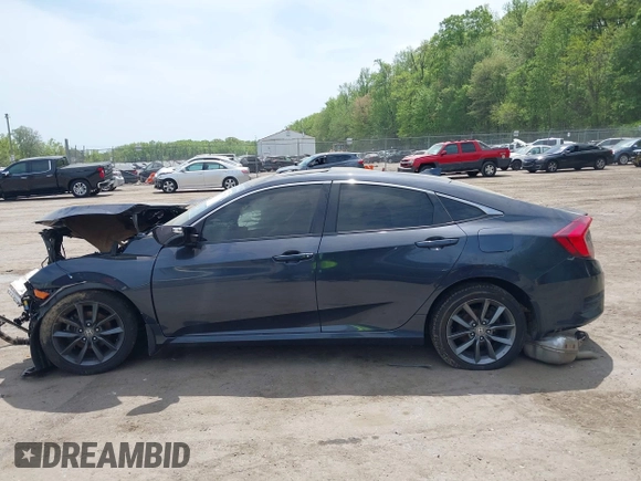 2019 Honda Civic EX z VIN JHMFC1F37KX008758, wystawiony jako IAAI lot #42077196 z przebiegiem Nie podano mil oraz . Historia ofert i sprzedaży dostępna na DreamBid. Obrazek 13.