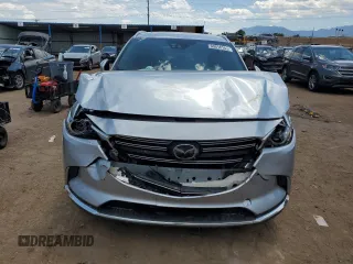 2016 Mazda CX-9 Grand Touring с VIN JM3TCADY2G0121026, выставлен на аукционе Copart как лот 60518105 с пробегом 104 923 миль миль и Списание • Salvage title. История ставок и продаж доступна на DreamBid. Изображение 5.