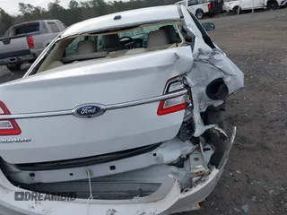 2016 Ford Taurus SE z VIN 1FAHP2D83GG131408, wystawiony jako IAAI lot #41552981 z przebiegiem 151 295 mil mil oraz . Historia ofert i sprzedaży dostępna na DreamBid. Obrazek 6.