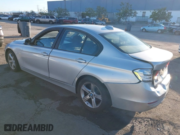2013 BMW 3 Series 320i with VIN WBA3B1C53DK129703, listed as a IAAI auction lot 41295234 with 175,506 mi miles. Bid and sale history available at carsss.com. Image 3.