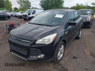 2013 Ford Escape SE with VIN 1FMCU9G99DUD71887, listed as a IAAI auction lot 42689284 with 70,662 mi miles and . Bid and sale history available at DreamBid. Image 2.