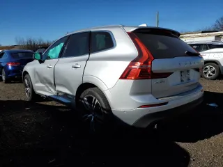 2018 Volvo XC60 Momentum with VIN LYV102RK3JB097333, listed as a Copart auction lot 81130574 with 76,499 mi miles and Salvage Title. Bid and sale history available at carsss.com. Image 2.