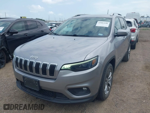 2021 Jeep Cherokee Altitude with VIN 1C4PJLLB2MD164004, listed as a IAAI auction lot 42083946 with 99,136 mi miles and . Bid and sale history available at DreamBid. Image 6.
