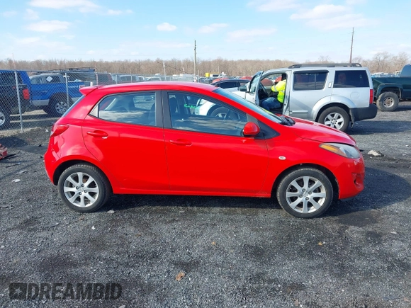 2012 Mazda 2 Touring z VIN JM1DE1LZ2C0152367, wystawiony jako IAAI lot #41526817 z przebiegiem 52 011 mil mil oraz . Historia ofert i sprzedaży dostępna na DreamBid. Obrazek 14.