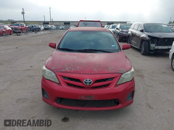 2011 Toyota Corolla L with VIN 2T1BU4EE2BC601203, listed as a IAAI auction lot 41913651 with 180,942 mi miles. Bid and sale history available at carsss.com. Image 6.
