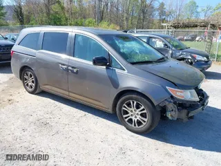 2011 Honda Odyssey EX-L with VIN 5FNRL5H60BB072101, listed as a IAAI auction lot 42002097 with 243,607 mi miles. Bid and sale history available at carsss.com. Image 1.