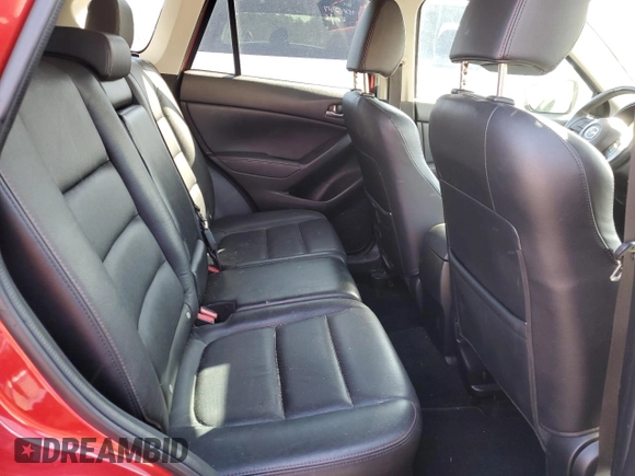 2014 Mazda CX-5 Grand Touring with VIN JM3KE4DY8E0421660, listed as a Copart auction lot 48588525 with 144,939 mi miles and Salvage Title. Bid and sale history available at DreamBid. Image 11.