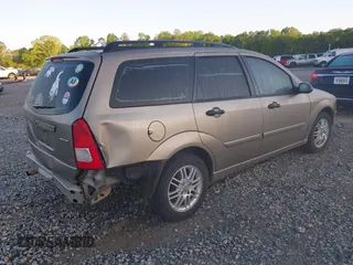 2005 Ford Focus SE with VIN 1FAFP36N15W304216, listed as a IAAI auction lot 41950778 with 241,997 mi miles and . Bid and sale history available at carsss.com. Image 4.