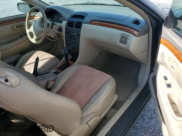 2002 Toyota Solara SE with VIN 2T1FF22P12C592550, listed as a Copart auction lot 74239934 with 221,988 mi miles and Salvage Title. Bid and sale history available at DreamBid. Image 8.