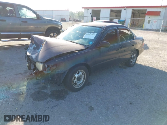 1997 Toyota Corolla with VIN 1NXBA02EXVZ634474, listed as a IAAI auction lot 41492504 with 147,080 mi miles and . Bid and sale history available at DreamBid. Image 2.