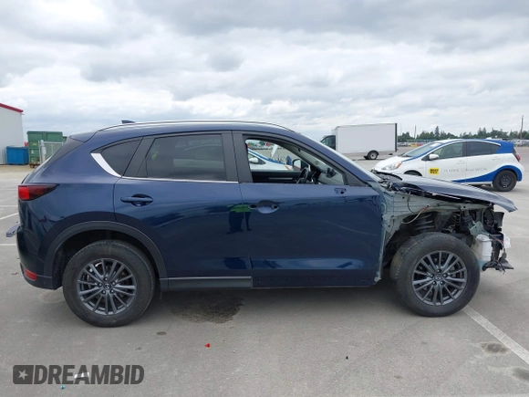 2020 Mazda CX-5 Touring with VIN JM3KFACM2L0856777, listed as a IAAI auction lot 42073972 with 151,628 mi miles. Bid and sale history available at carsss.com. Image 14.