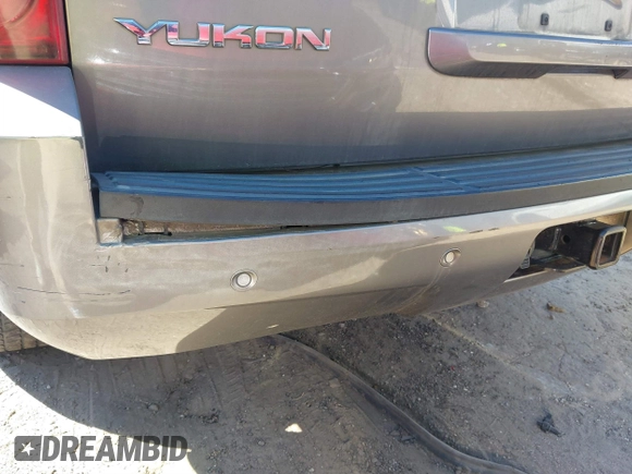 2007 GMC Yukon SLT z VIN 1GKFC13007J138584, wystawiony jako IAAI lot #41750793 z przebiegiem Nie podano mil oraz . Historia ofert i sprzedaży dostępna na DreamBid. Obrazek 13.