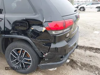 2019 Jeep Grand Cherokee Trailhawk with VIN 1C4RJFLT3KC554292, listed as a IAAI auction lot 41953049 with 31,672 mi miles and . Bid and sale history available at DreamBid. Image 6.