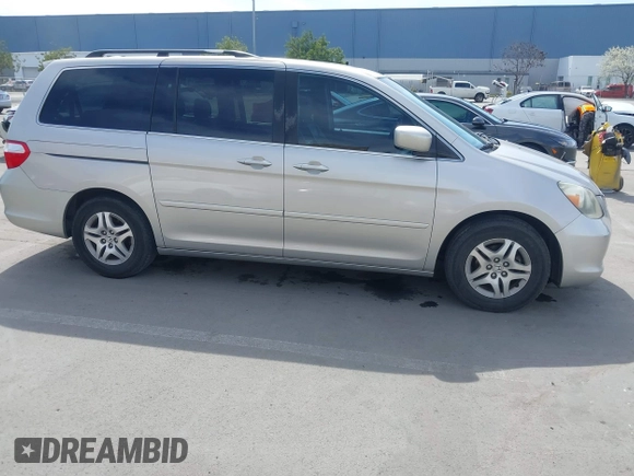 2006 Honda Odyssey EX-L z VIN 5FNRL38736B089963, wystawiony jako IAAI lot #41858061 z przebiegiem 178 845 mil mil oraz . Historia ofert i sprzedaży dostępna na DreamBid. Obrazek 13.