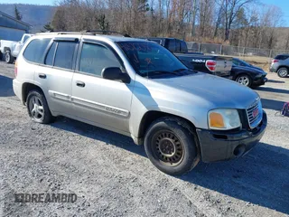 2004 GMC Envoy SLE with VIN 1GKDT13S842134524, listed as a IAAI auction lot 41610041 with 217,166 mi miles. Bid and sale history available at carsss.com. Image 1.