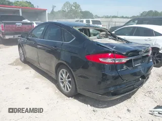 2017 Ford Fusion SE z VIN 3FA6P0HDXHR198388, wystawiony jako IAAI lot #42231069 z przebiegiem 143 709 mil mil oraz . Historia ofert i sprzedaży dostępna na DreamBid. Obrazek 3.