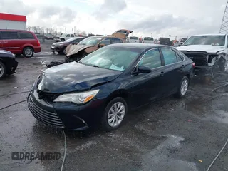 2015 Toyota Camry XLE with VIN 4T1BF1FK4FU043212, listed as a IAAI auction lot 41706573 with 170,074 mi miles and . Bid and sale history available at DreamBid. Image 2.
