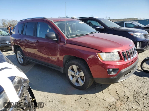 2012 Jeep Compass Sport with VIN 1C4NJCBB2CD631834, listed as a Copart auction lot 82886354 with 208,705 mi miles and Salvage Title. Bid and sale history available at carsss.com. Image 4.