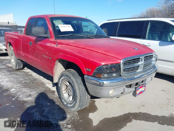 1999 Dodge Dakota SLT with VIN 1B7GG22Y3XS289253, listed as a IAAI auction lot 41283728 with 154,038 mi miles and . Bid and sale history available at carsss.com. Image 1.