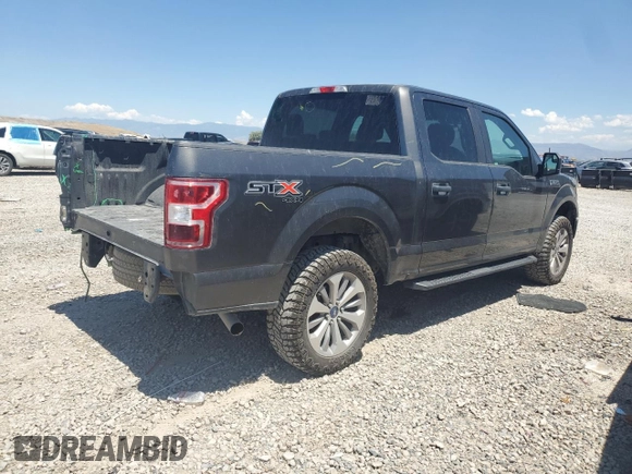 2018 Ford F-150 XL with VIN 1FTEW1EPXJKE71093, listed as a Copart auction lot 63812265 with 122,361 mi miles and Salvage title. Bid and sale history available at DreamBid. Image 3.