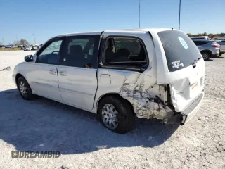 2004 Kia Sedona LX with VIN KNDUP131046585706, listed as a Copart auction lot 74973304 with 107,130 mi miles and Salvage Title. Bid and sale history available at carsss.com. Image 2.