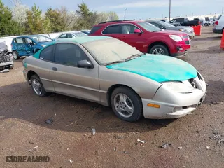 2003 Pontiac Sunfire with VIN 1G2JB12F237312035, listed as a IAAI auction lot 41727230 with 165,534 mi miles. Bid and sale history available at carsss.com. Image 1.