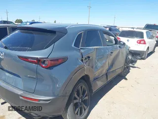 2024 Mazda CX-30 S Preferred with VIN 3MVDMBCM5RM606886, listed as a IAAI auction lot 41867949 with 15,410 mi miles and . Bid and sale history available at DreamBid. Image 6.