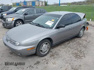 1997 Saturn SL with VIN 1G8ZK527XVZ257477, listed as a IAAI auction lot 42029648 with 114,371 mi miles and . Bid and sale history available at DreamBid. Image 2.