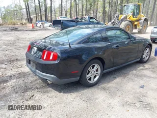 2012 Ford Mustang V6 Premium with VIN 1ZVBP8AM1C5205321, listed as a IAAI auction lot 41877052 with 120,412 mi miles. Bid and sale history available at carsss.com. Image 4.