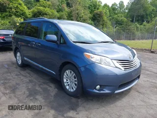 2016 Toyota Sienna XLE z VIN 5TDYK3DC0GS766059, wystawiony jako IAAI lot #42214738 z przebiegiem 143 001 mil mil oraz . Historia ofert i sprzedaży dostępna na DreamBid. Obrazek 1.