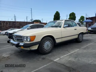 1987 Mercedes-Benz 560 SL z VIN WDBBA48D1HA056649, wystawiony jako Copart lot #56768755 z przebiegiem 58 739 mil mil oraz Czysty tytuł • Clean title. Historia ofert i sprzedaży dostępna na DreamBid. Obrazek 1.