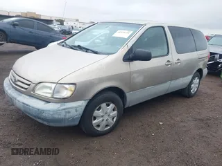 2001 Toyota Sienna CE with VIN 4T3ZF19C51U329489, listed as a IAAI auction lot 41535721 with 218,839 mi miles. Bid and sale history available at carsss.com. Image 2.