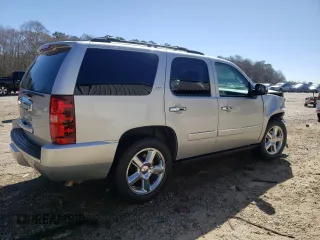 2013 Chevrolet Tahoe LTZ with VIN 1GNSCCE03DR374265, listed as a Copart auction lot 49290765 with 206,584 mi miles and Salvage title. Bid and sale history available at DreamBid. Image 3.