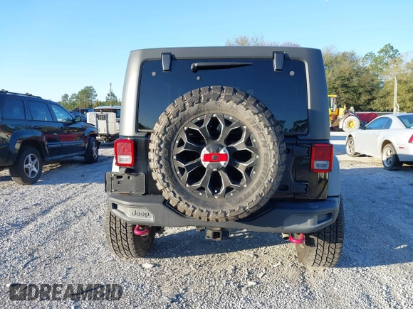 2015 Jeep Wrangler Unlimited Rubicon with VIN 1C4BJWFGXFL610153, listed as a IAAI auction lot 41575401 with 114,583 mi miles. Bid and sale history available at carsss.com. Image 16.